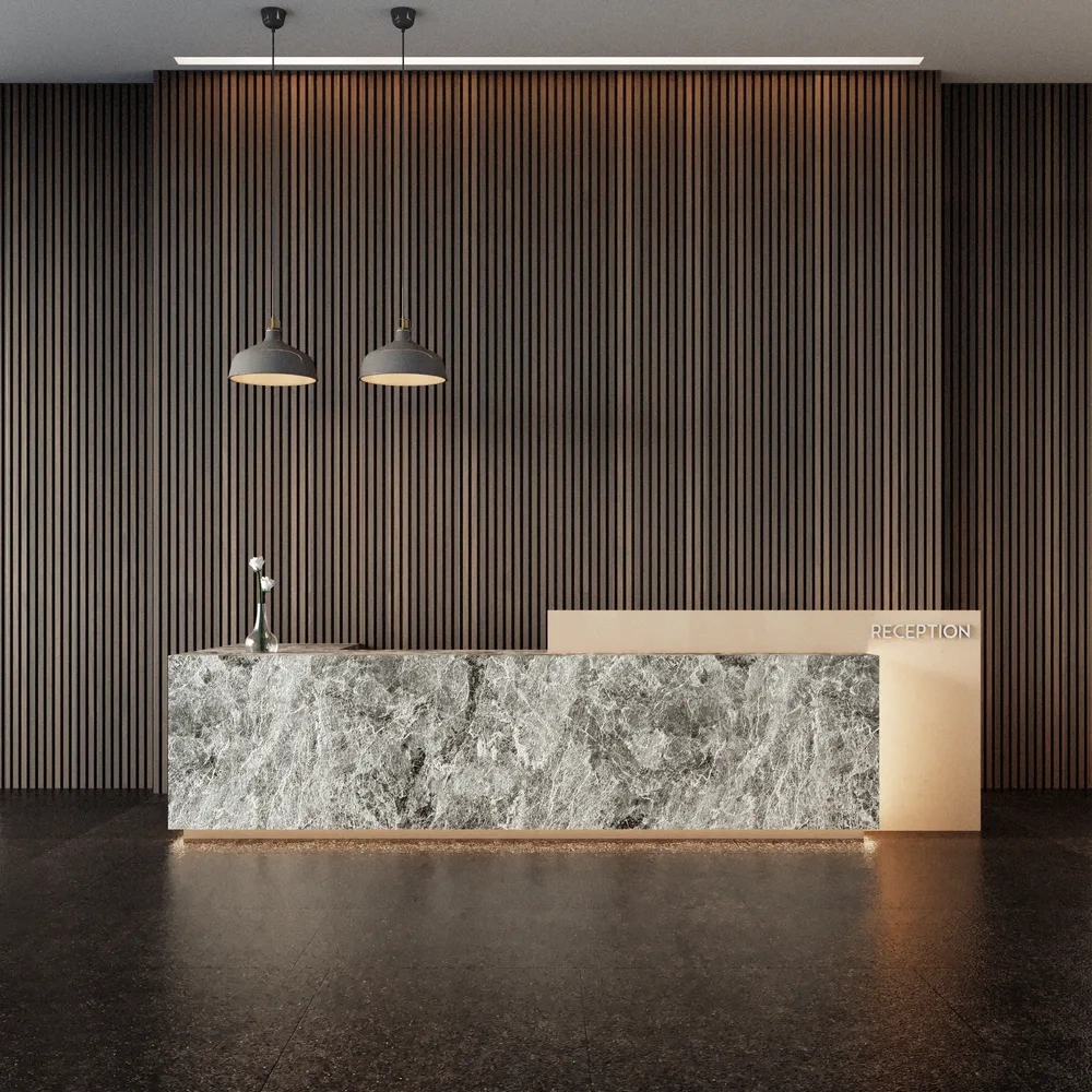 Vertical timber slat wall paired with a marble counter and pendants